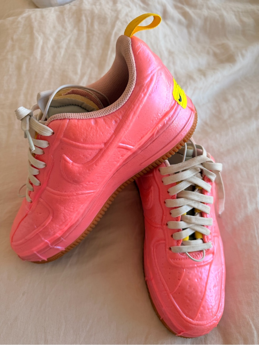 Nike Women’s Bright Pink Sneakers with Yellow Pull Tab
